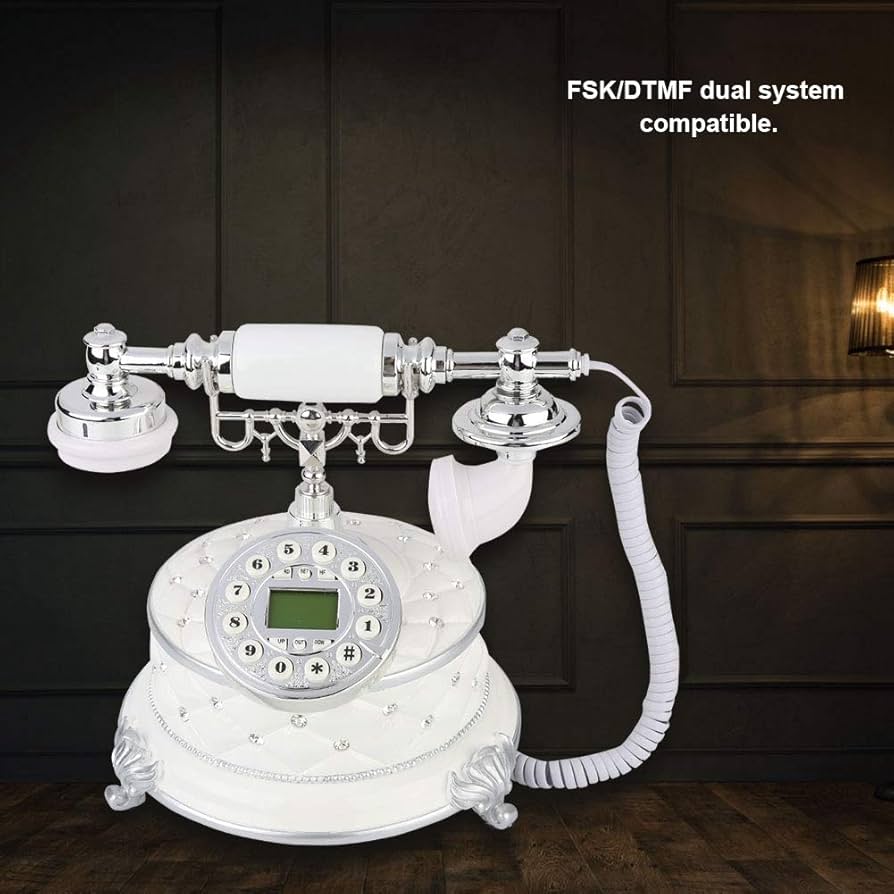 アンティーク電話 Antique Telephone with Rotary Dial and Classic Ringtone Design.